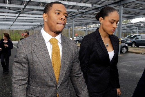 The longest walk: Rice and Palmer hold hands on the way to court.